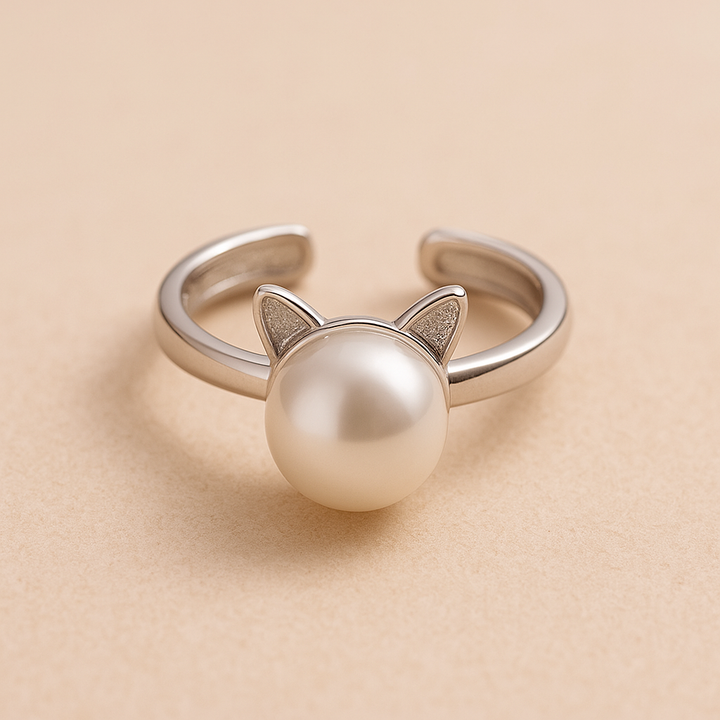 Krásné kočičí a perlové náhrdelníky s náušnicemi a prstenem